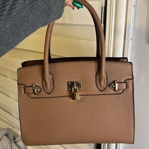Brown and gold purse